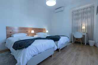 Kamar Tidur 4 Lagoa Hostel & Suites