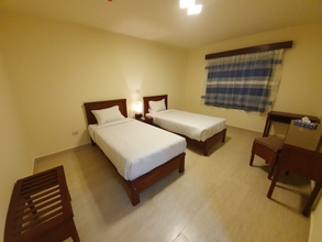 Phòng ngủ 4 Fanar Hotel