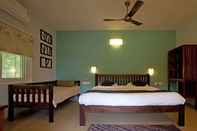 Phòng ngủ Jungle Hut Resorts