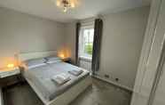 Bedroom 6 Beautiful 2-bed Apartment in Renfrew