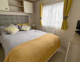Bedroom 2 Impeccable 3-bed Cabin in Tattershall, UK
