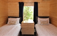 Bedroom 5 Stunning 5-bed Cabin in Ashton Under Hill