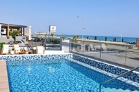 Swimming Pool Calla Luxury Seafront Suites