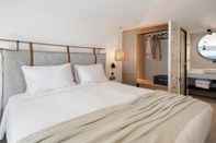 Bilik Tidur Calla Luxury Seafront Suites