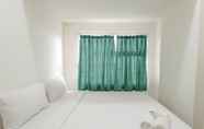 Phòng ngủ 3 Nice And Homey 2Br At Vida View Makassar Apartment