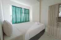 ห้องนอน Nice And Homey 2Br At Vida View Makassar Apartment