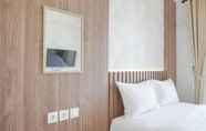 Bedroom 6 Warm And Cozy Stay Studio Apartment At Sky House Bsd