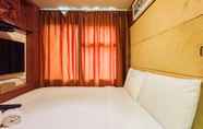 ห้องนอน 2 Classic Luxury 2Br At Vida View Makassar Apartment