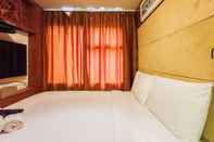 ห้องนอน Classic Luxury 2Br At Vida View Makassar Apartment