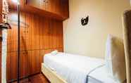 ห้องนอน 7 Classic Luxury 2Br At Vida View Makassar Apartment