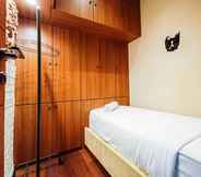 Bedroom 7 Classic Luxury 2Br At Vida View Makassar Apartment