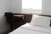 Bedroom Homey And Minimalist 2Br At Patraland Urbano Apartment