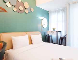 Bedroom 2 Warm And Homey Studio At Vida View Makassar Apartment