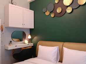 Kamar Tidur 4 Warm And Homey Studio At Vida View Makassar Apartment