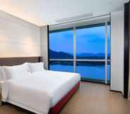 Bedroom 2 Ramada By Wyndham Huzhou Wuxing