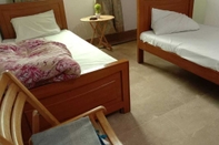 Kamar Tidur Chinar Guest House