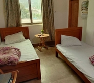 Kamar Tidur 5 Chinar Guest House