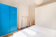 Bedroom Centrally Located Bright 2 Room Apartment in Trendy st Gilles Self Check in