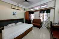 Bedroom Hotel Pradyut