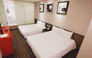 Kamar Tidur 6 Ximen Garden Hotel