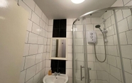 In-room Bathroom 4 Impeccable 2-bed Apartment by Cardiff City Centre