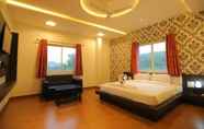 ห้องนอน 4 Raha Hotel