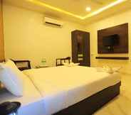 Phòng ngủ 2 Raha Hotel
