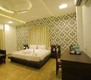 Phòng ngủ 3 Raha Hotel