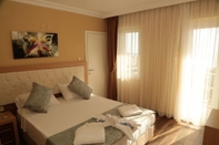 Kamar Tidur Hotel Room With Shared Pool Near Beach in Kusadasi