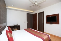 ห้องนอน Hotel Mukund Residency