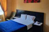Phòng ngủ Hotel Loma Dorada