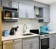 Bilik Tidur 3 A Lovely Studio with Full Kitchen & AC