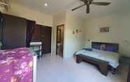 ห้องนอน 4 Baan Muchshima Hostel Phuket