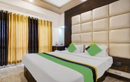 Kamar Tidur 2 Treebo Trend Mangal Residency