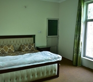 Bedroom 4 AJK Guest House