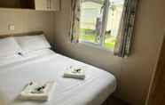 Bedroom 4 Adorable Caravan in Newquay Bay Resorts Nb98