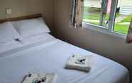 Bedroom 3 Adorable Caravan in Newquay Bay Resorts Nb98