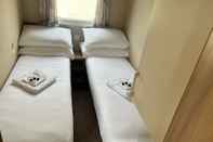 Bedroom Adorable Caravan in Newquay Bay Resorts Nb98