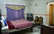 Bilik Tidur 6 State Continental Guest House