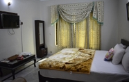 Kamar Tidur 7 Neelum Guest House