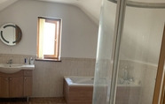 In-room Bathroom 5 Captivating 4-bed House in West Wales