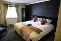 Kamar Tidur The Charlton Boutique Hotel