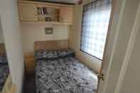 Kamar Tidur Charming 3-bed Caravan Cymtydu