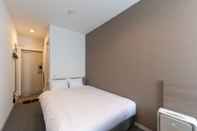 Bedroom HOTEL R9 The Yard Uki