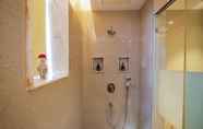 In-room Bathroom 7 Gulab Kothi Varanasi by Royal Orchid Hotels Limited