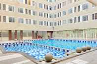 Swimming Pool Cozy Studio Apartment At Emerald Towers Bandung