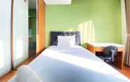 Bedroom 5 Warm Studio Apartment at Harvard Jatinangor