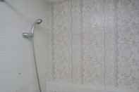 In-room Bathroom Minimalist And Warm 2Br At Bassura City Apartment