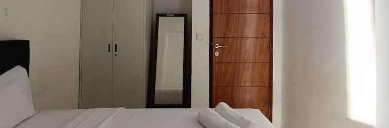 Bedroom 2Br Homey At Vida View Makassar Apartment