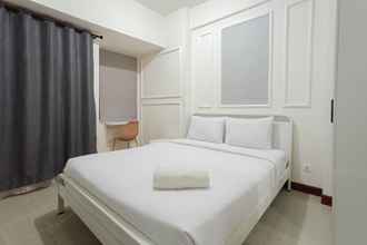Bedroom 4 White And Cozy Studio At Vida View Makassar Apartment
